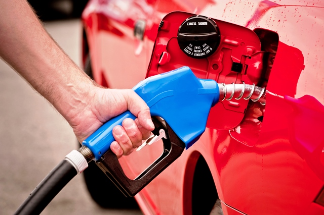 pumping gas into a car